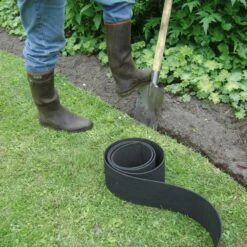 Gazonafboording ECO Rubber - 15 M × 10 Cm 7 Gazonafboording ECO Rubber - 15 M × 10 Cm -Tuindecoratie Winkel eco 15m x 10 cm gazonboord 1484057823 3 600